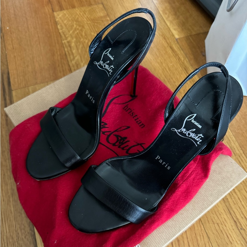 MARILYN LOUBOUTIN